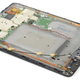 Illustration for article titled Kindle Voyage Teardown: It Sure Is Cramped Behind That Glass Screen